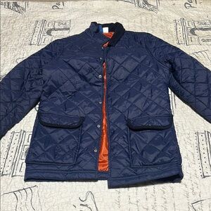 Divided Blue and Orange Puffer Jacket with Quilted Design